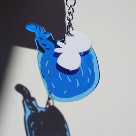 Keychain | Cat in the blue bottle.